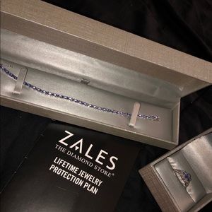 Brand new Zale’s bracelet & ring.